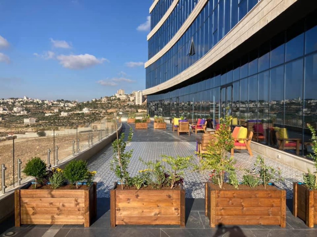 The fifth-floor garden terrace, planted along the parapet and open to the view