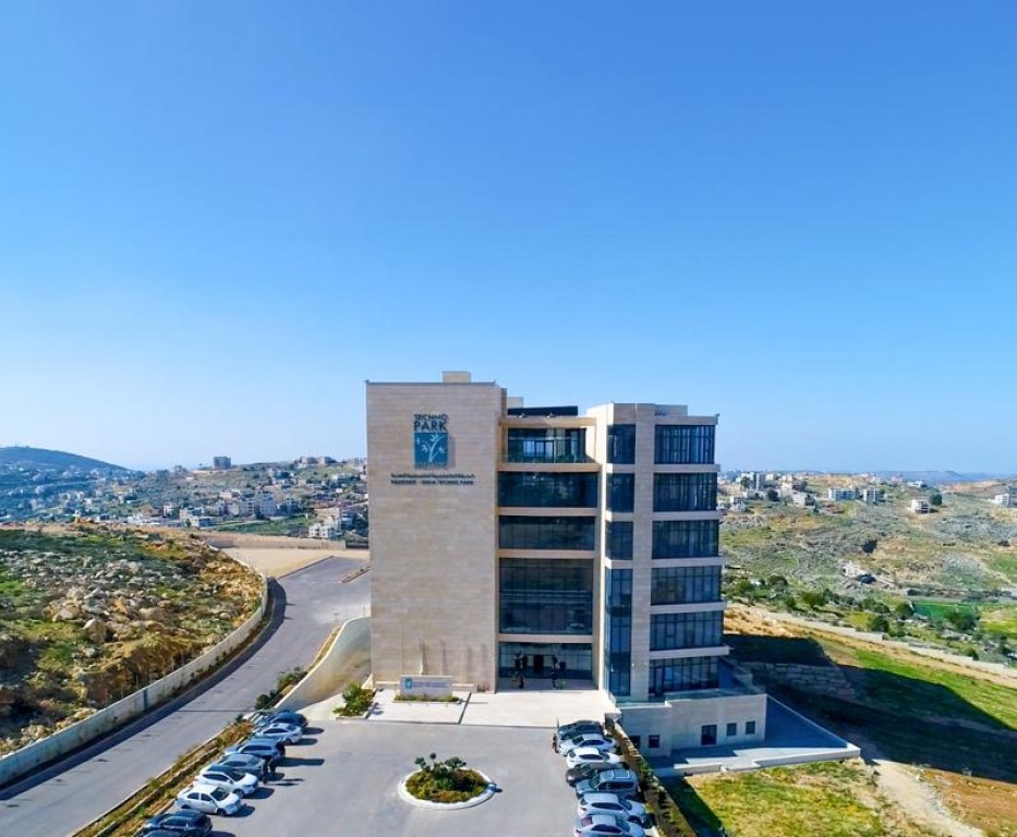 The main building and the hills around it, seen from the air