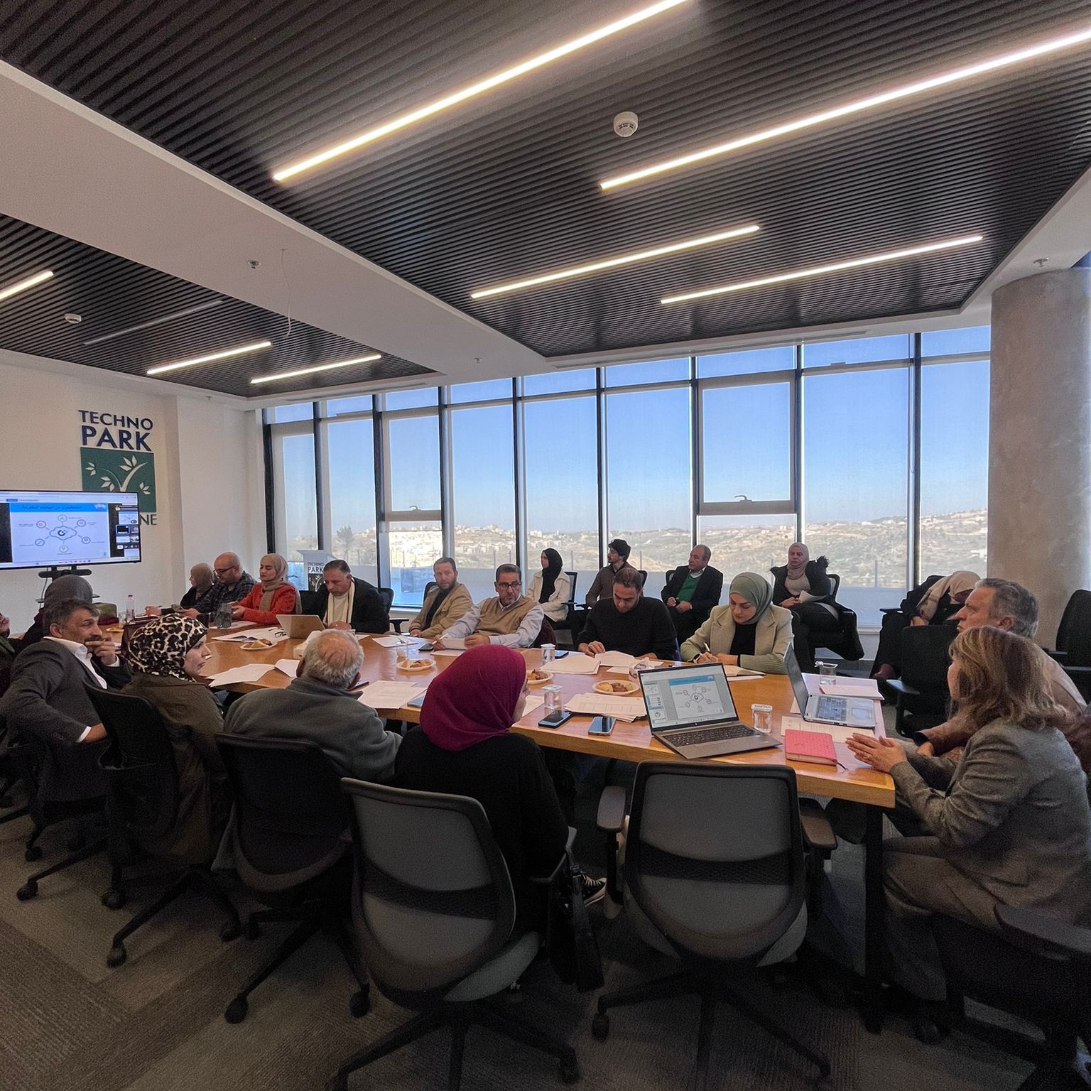 A meeting underway in the seminar room