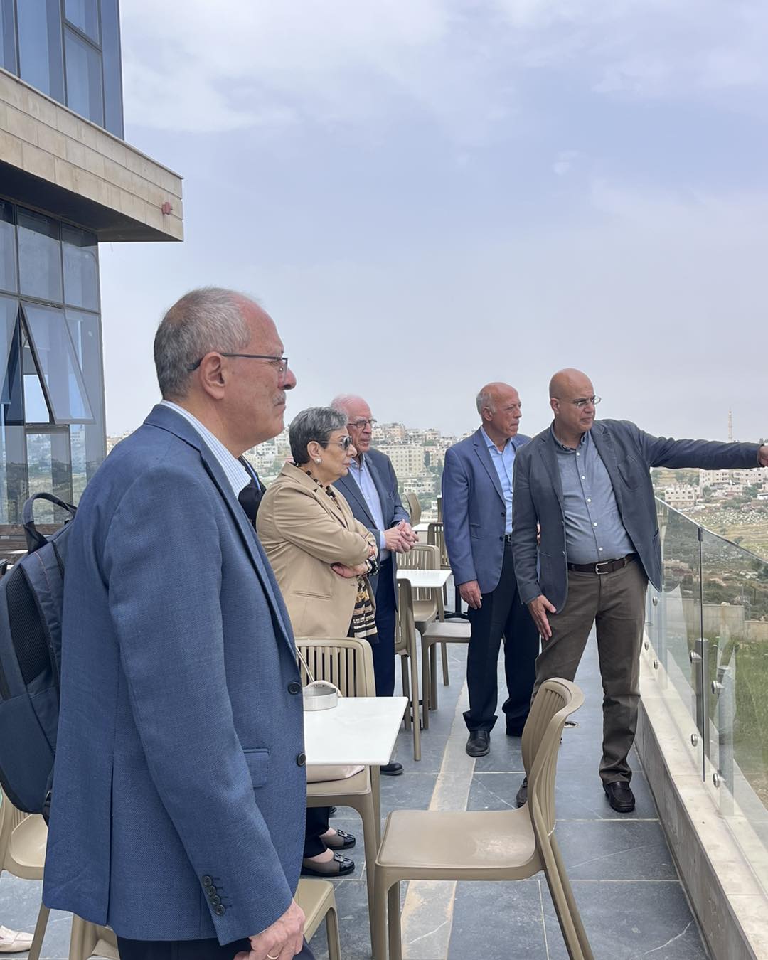 Guests on the terrace looking out over the hills