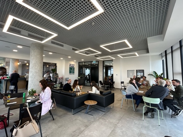Groups talking across the seating area of the cafe